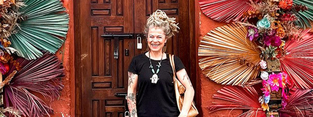 Michelle Allen standing in front of a door