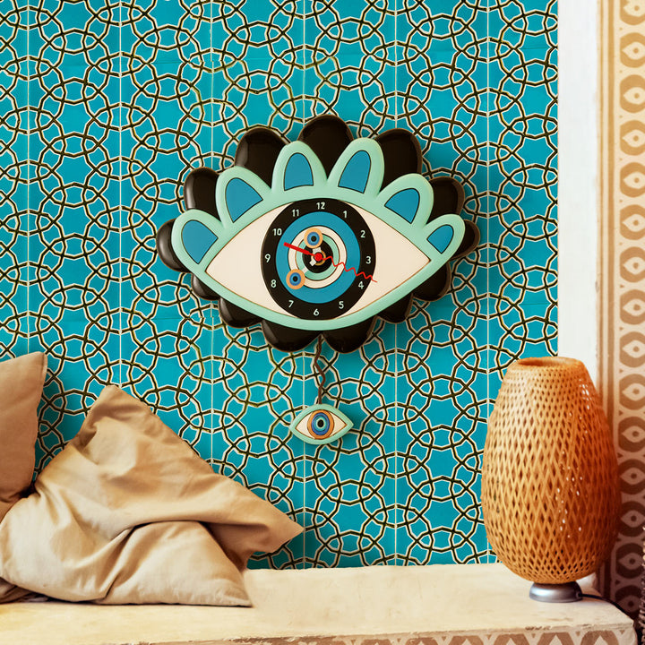 Envy of my Eye Wall Clock on a Moroccan tile wall.