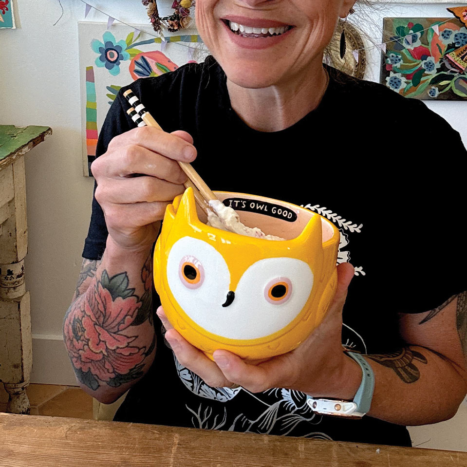Michelle Allen eating out of a bowl